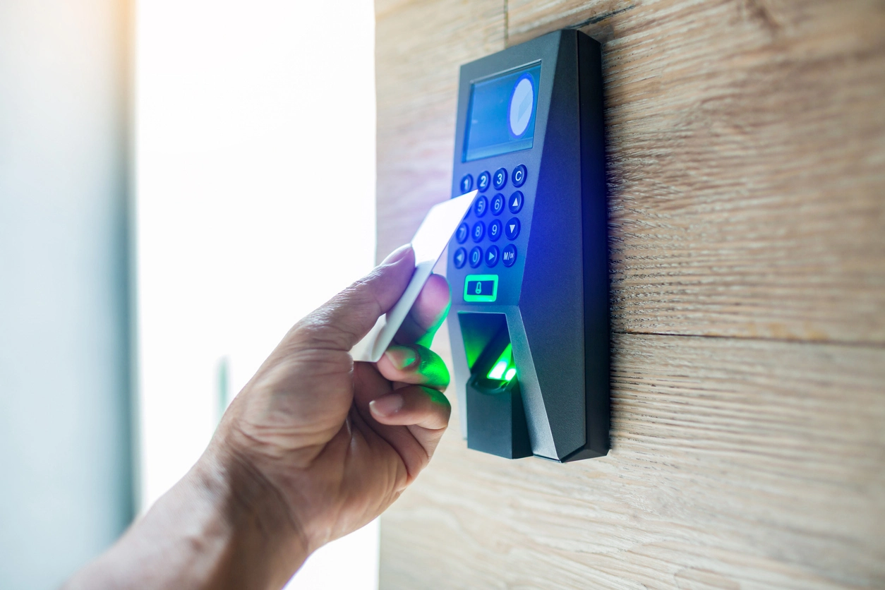 commercial door access control reader at building entrance