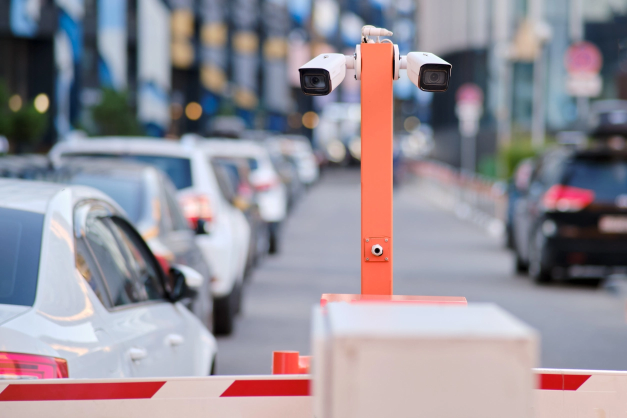 car dealership vehicle lot monitored with license plate cameras