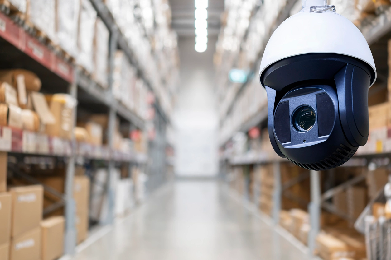 warehouse surveillance cameras monitoring loading docks and inventory areas