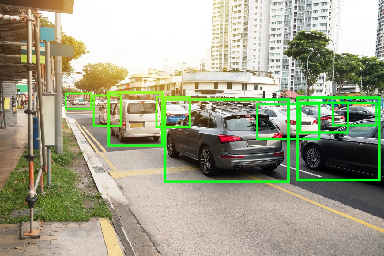 AI analytics monitoring multiple vehicles in a commercial parking area