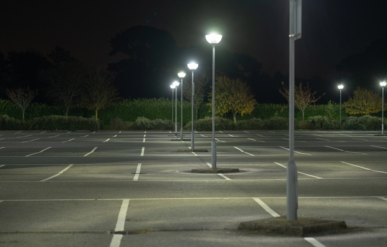 campus exterior monitored by infrared security cameras at night