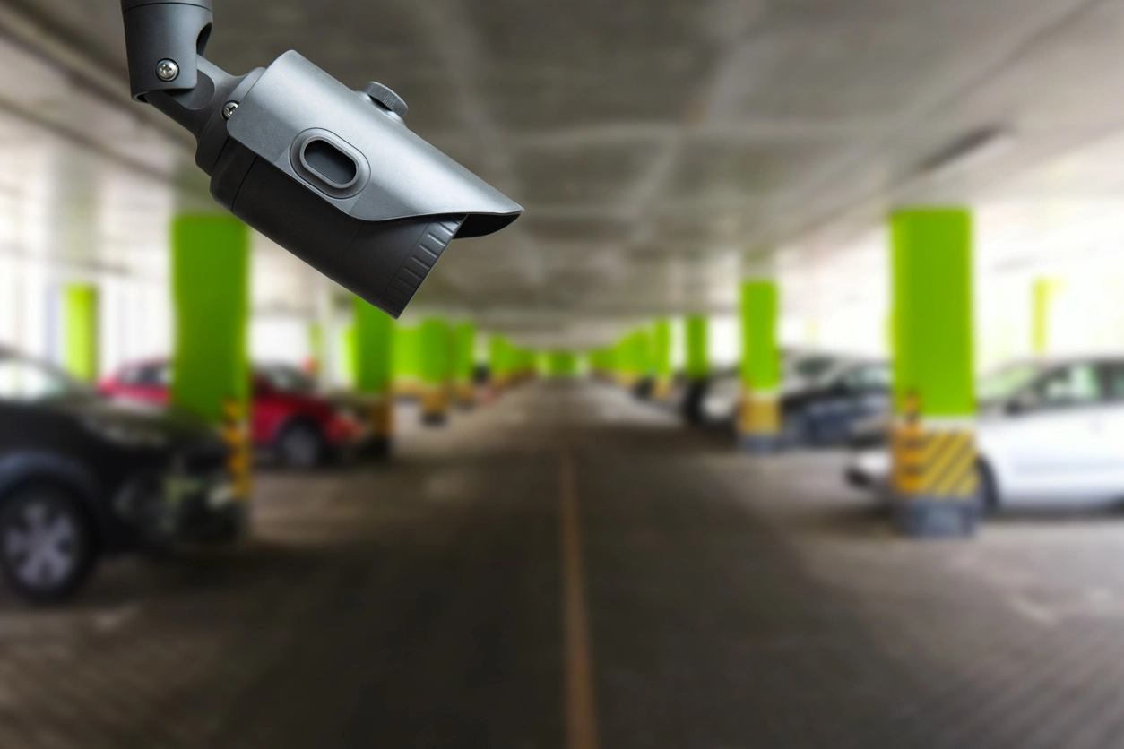 object tracking security camera monitoring movement in business parking lot
