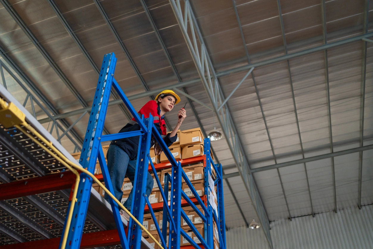 PoE security camera installed in warehouse connected by Ethernet cable