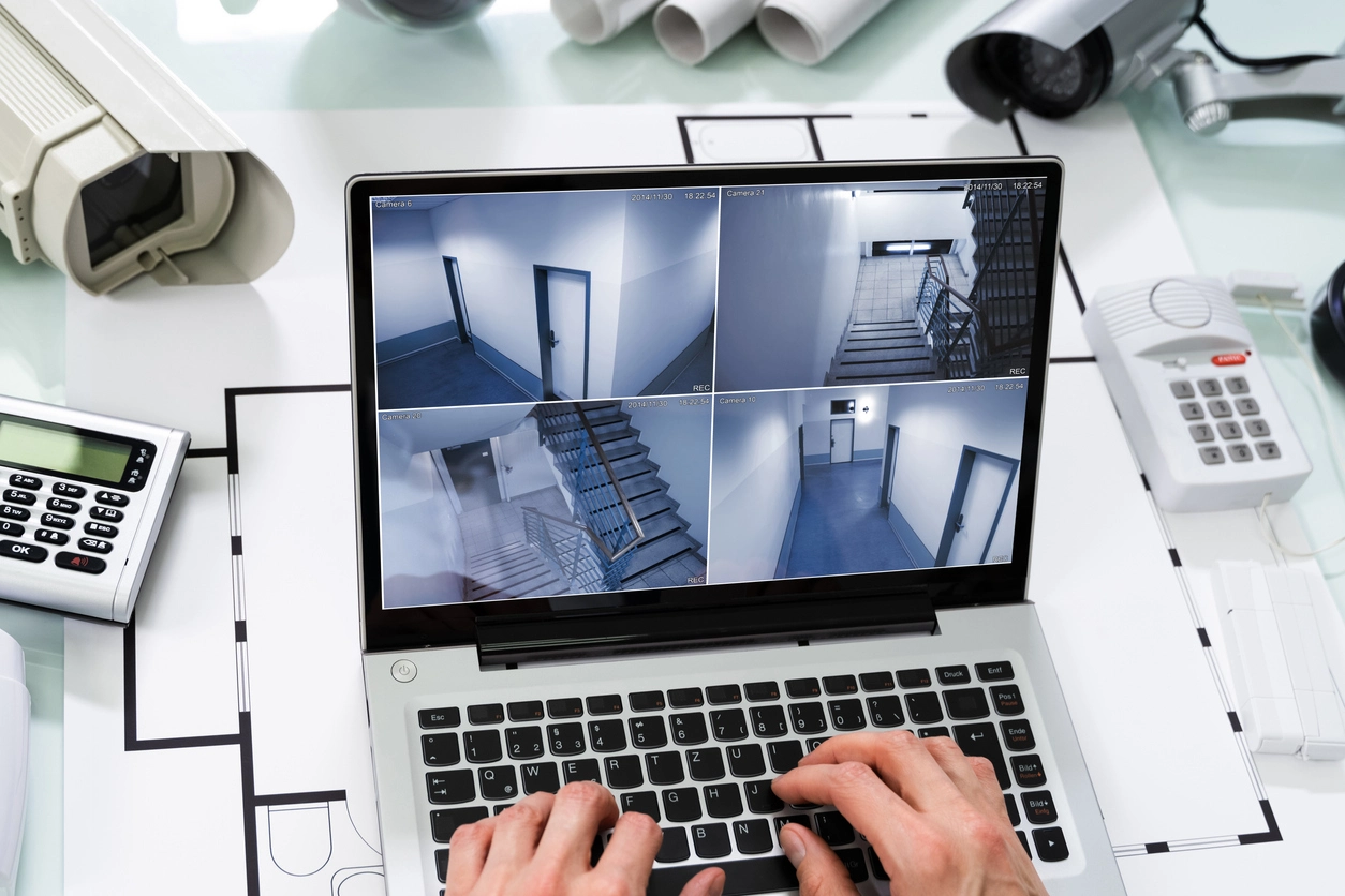 remote access security camera app showing live business surveillance cameras on mobile phone