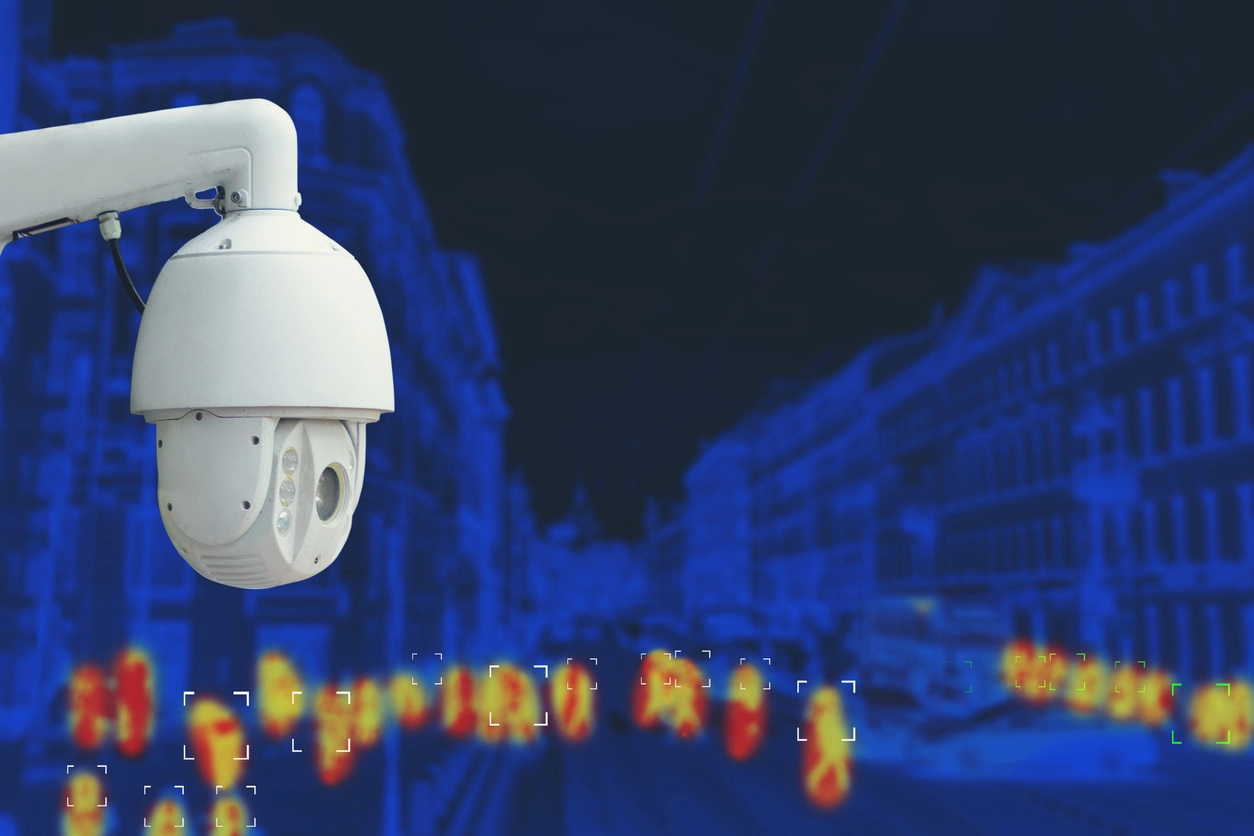 thermal security camera view showing heat signatures around commercial property