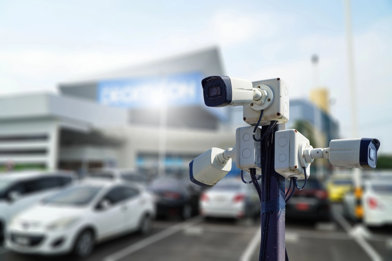 weatherproof security camera monitoring commercial parking lot outdoors