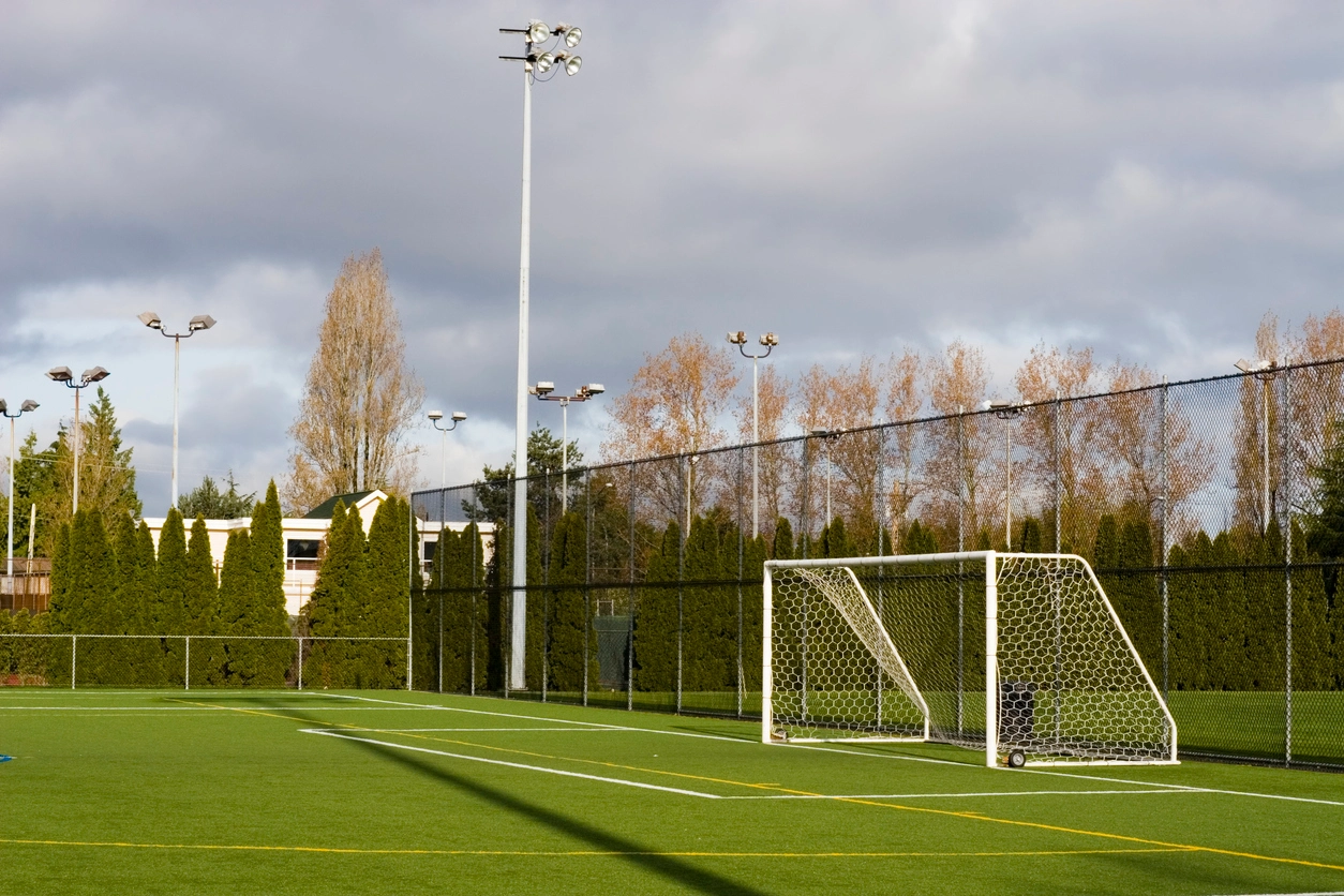security camera monitoring public park athletic field and spectator area