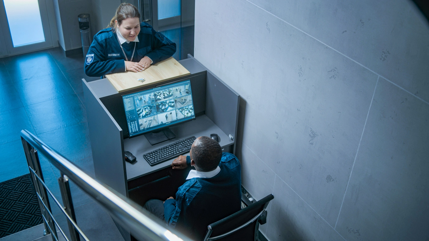 security camera monitoring jail booking area
