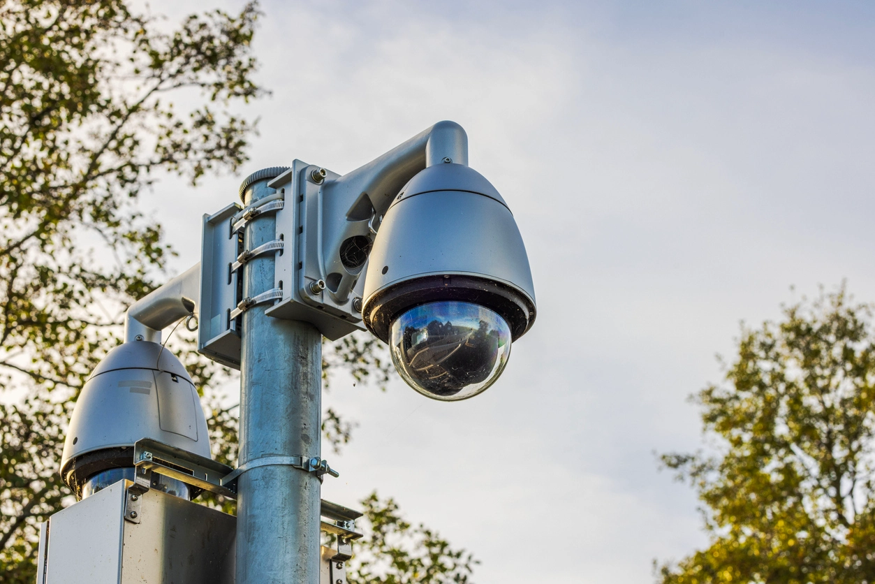 Outdoor security camera monitoring a public park environment