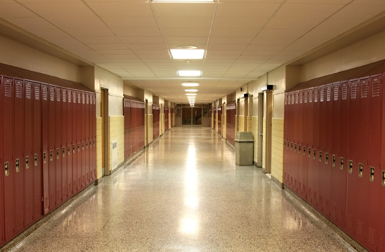 security camera monitoring school common area with students and staff