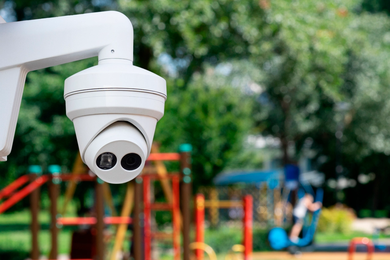security camera monitoring school playground equipment and play area