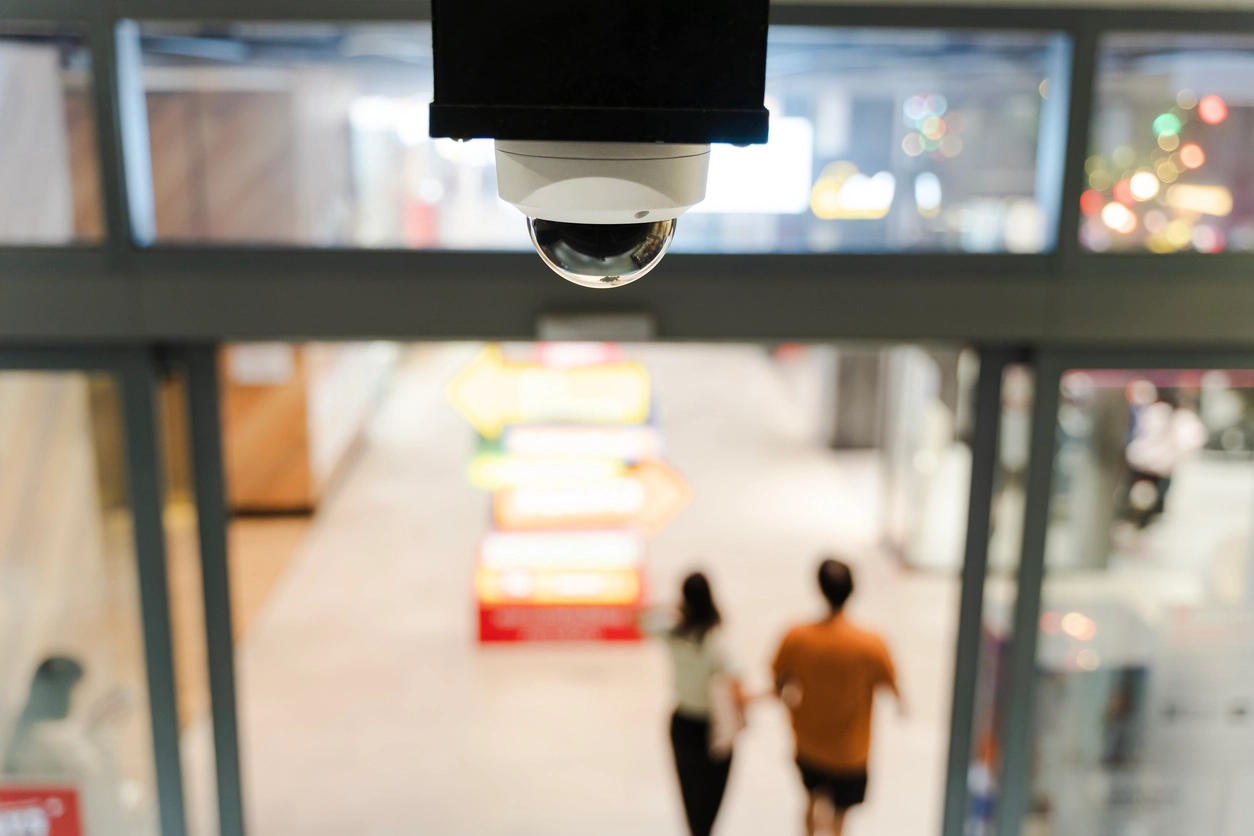 security camera monitoring student commons area in school