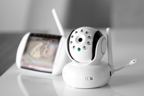 A Security Camera monitoring a baby in a cradle