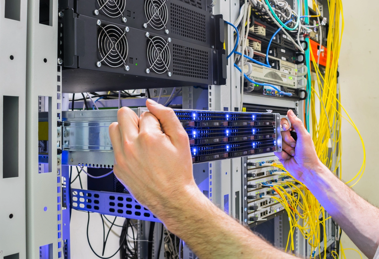 technician planning upgrade from analog CCTV to digital IP security cameras
