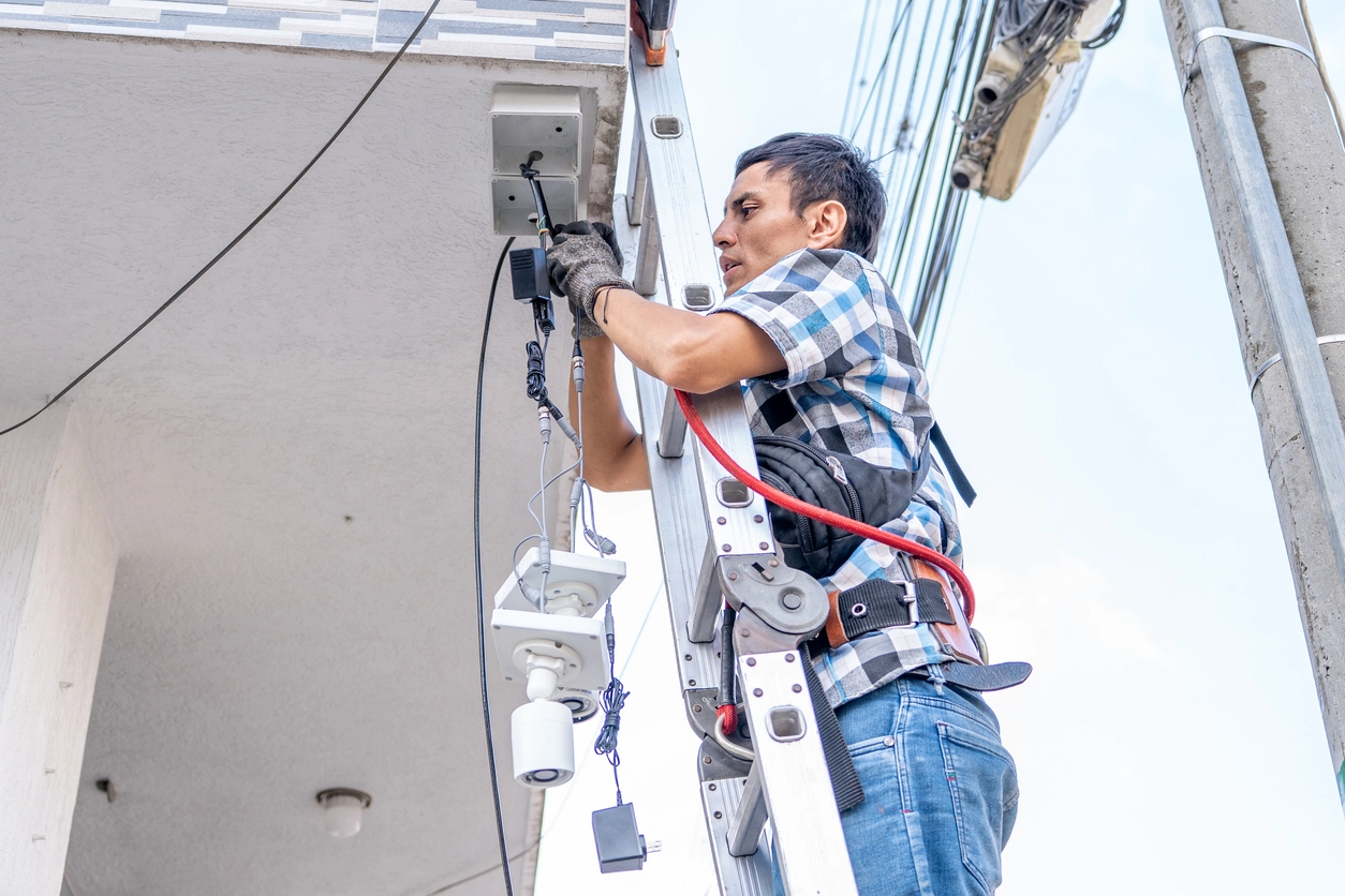 outdoor security camera installation overlooking commercial parking lot