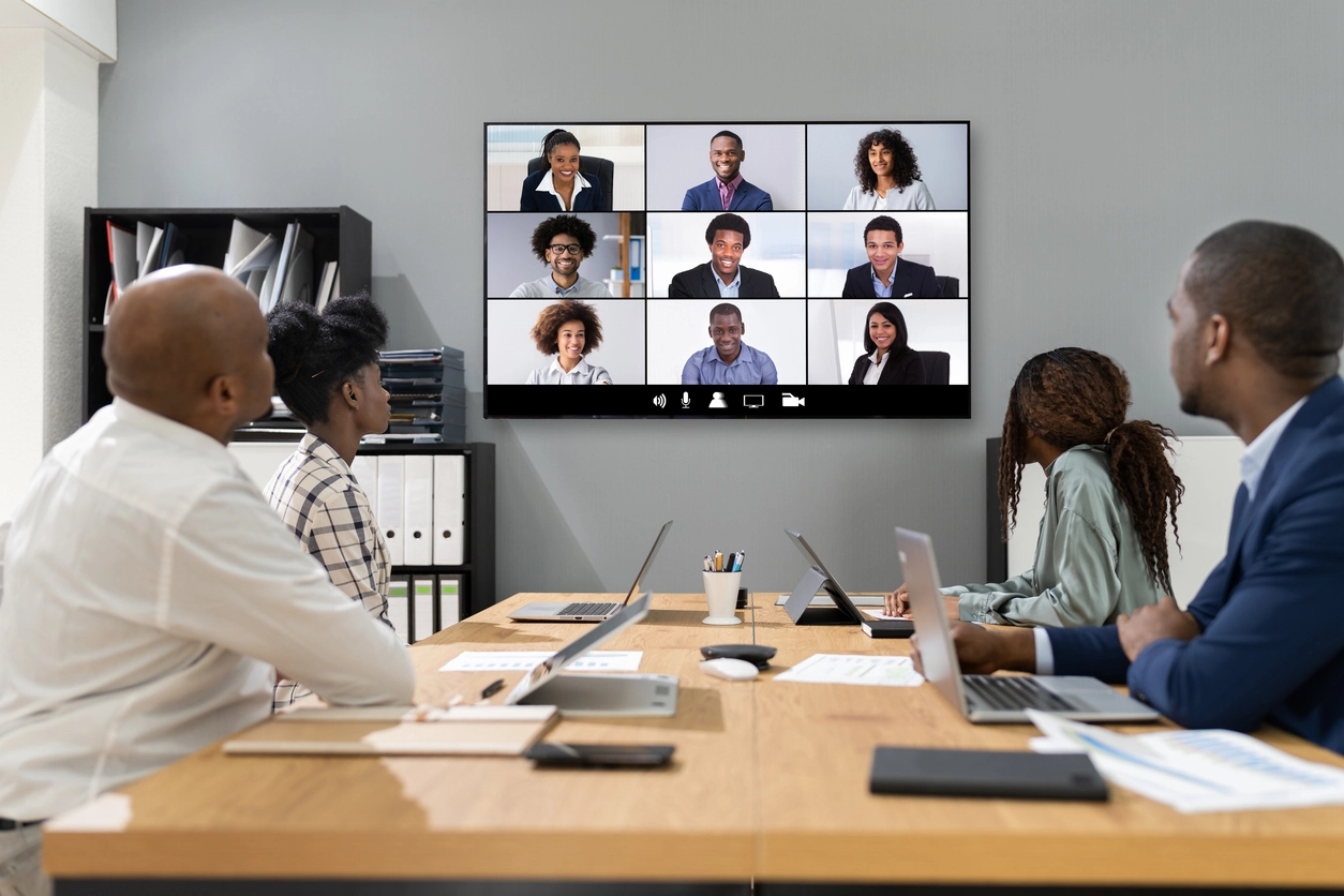 hybrid office meeting space with professional video conferencing camera